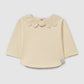 Maglia in cotone biologico a maniche lunghe con colletto inglese ricamato con volant