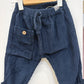 Pantaloni pull-up in velluto a coste con tasca