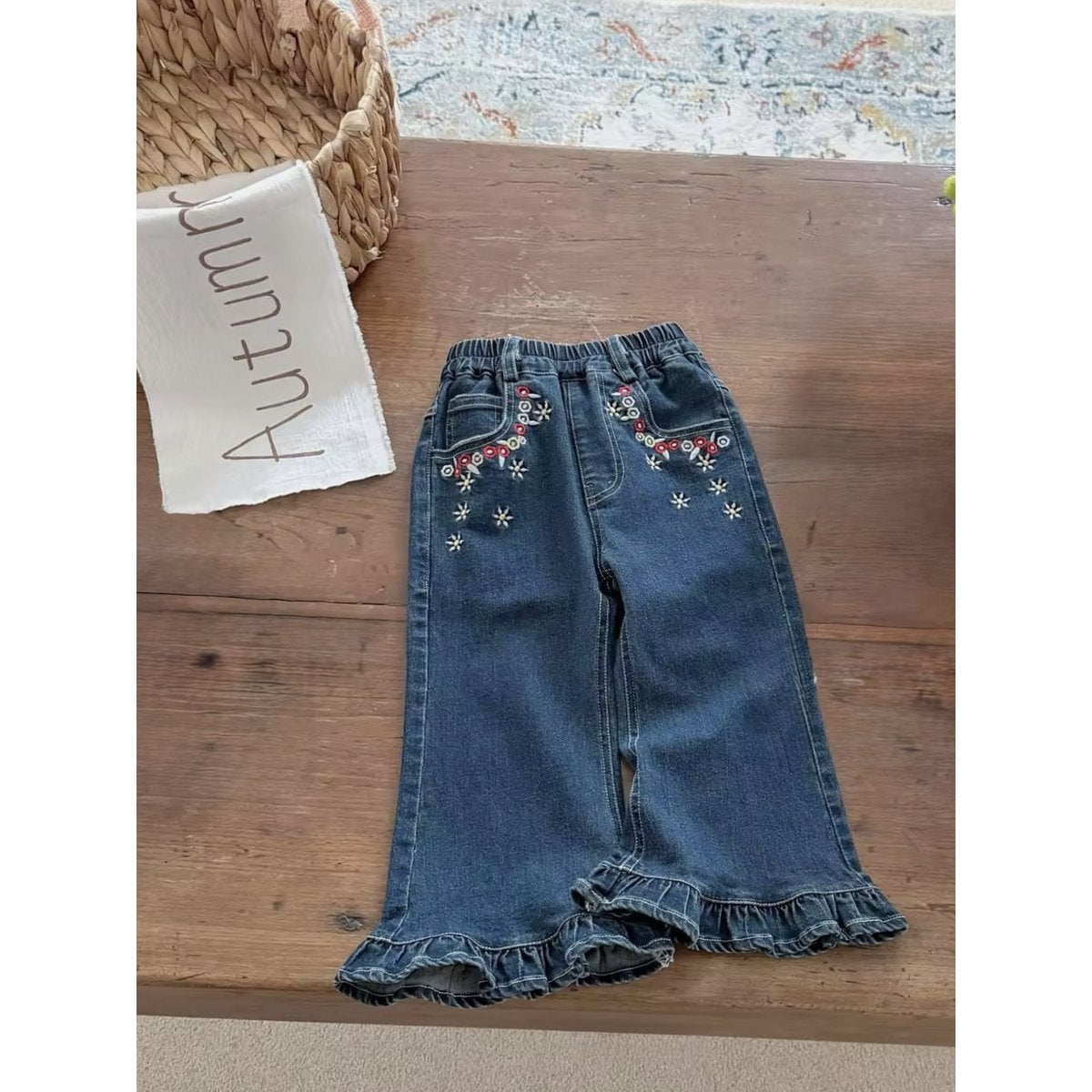 Pantaloni in denim con ricamo
