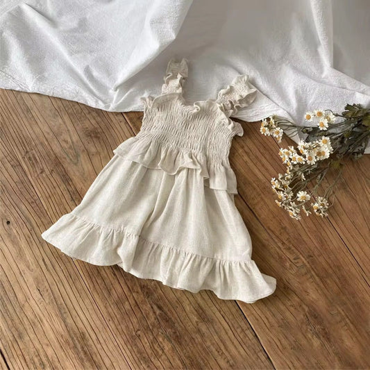 Vestito Raya con cinturino e volant in punto smock 