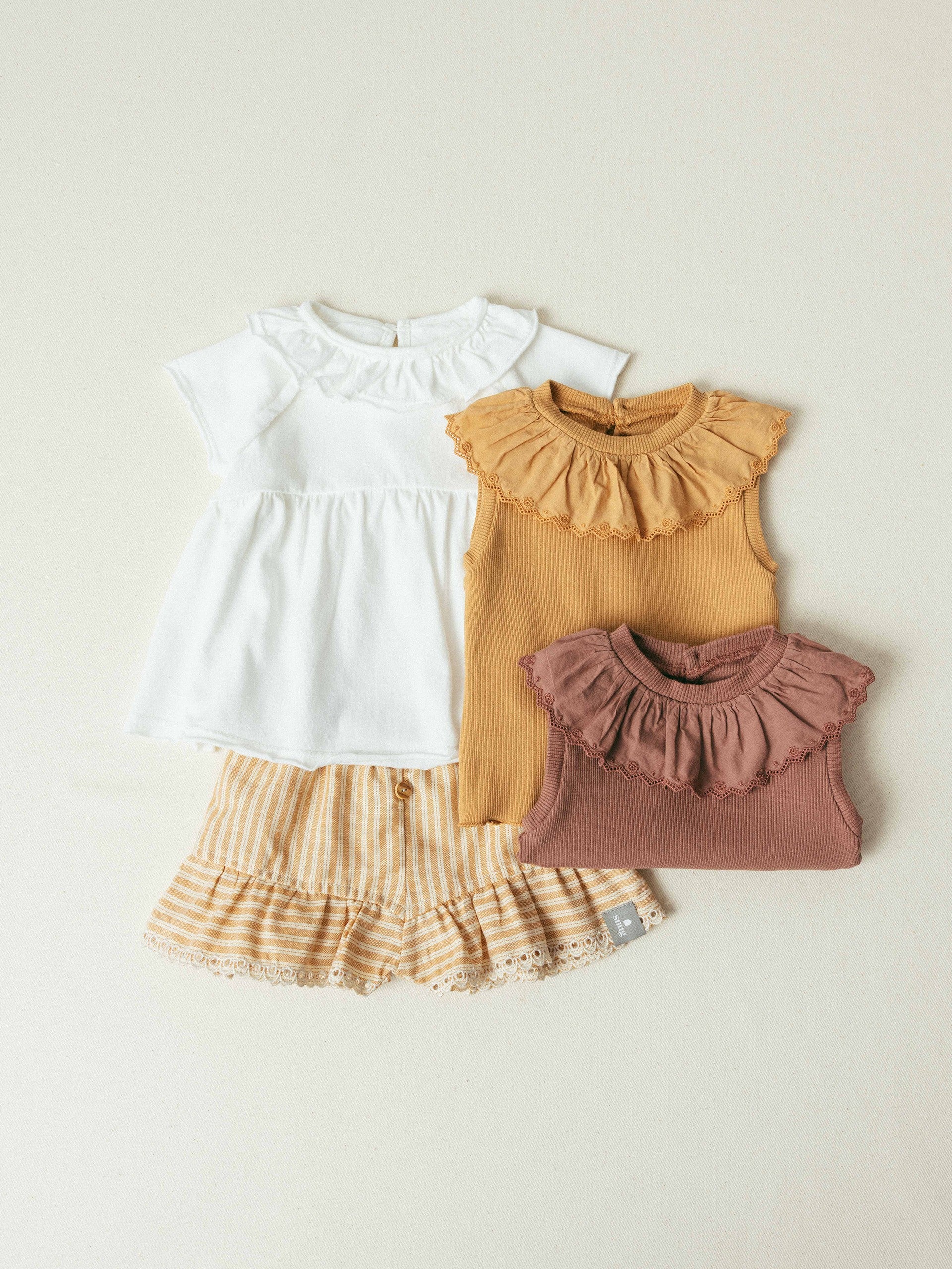 Shorts pull-up in tessuto rigato e dettaglio ricamo inglese pantaloncino