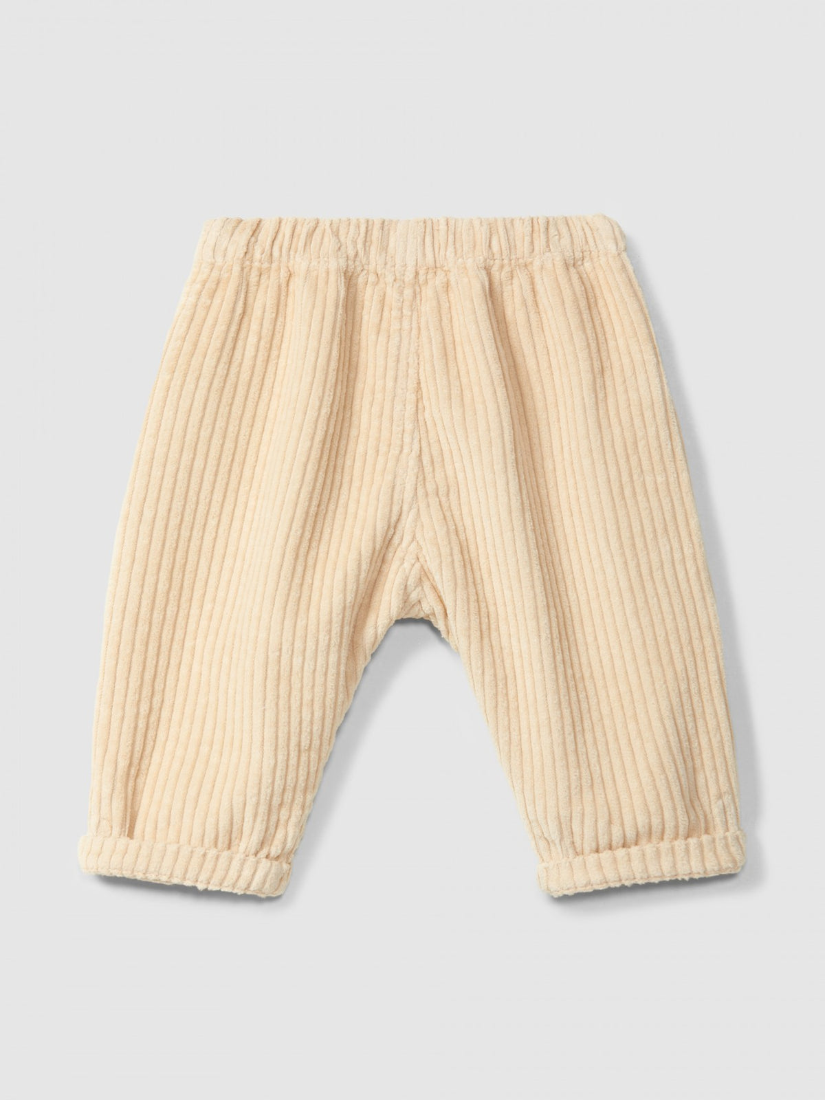 Pantaloni a tiro in velluto a coste con tasca a cuore