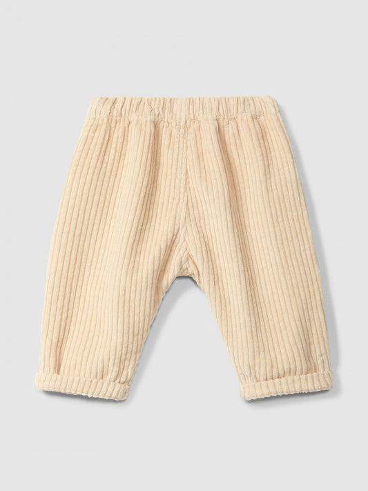Pantaloni a tiro in velluto a coste con tasca a cuore