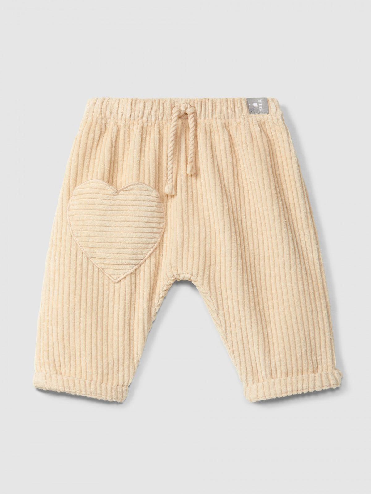 Pantaloni a tiro in velluto a coste con tasca a cuore